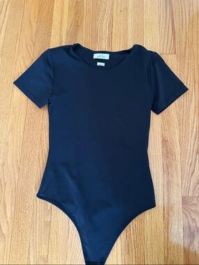 Aritzia Black Short-Sleeve Kids One-Piece Bodysuit